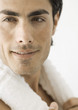 Man with towel around neck, close-up