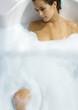 Woman taking bubble bath
