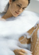 Woman taking bubble bath