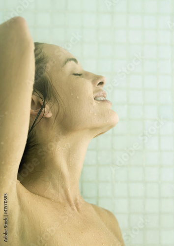 Photo: Woman taking shower Woman taking shower
