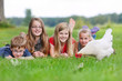 children with a chicken
