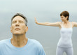 Mature couple exercising