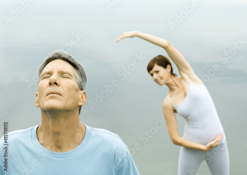 Photo: Mature couple exercising Mature couple exercising