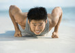 Man doing push-ups on knuckles