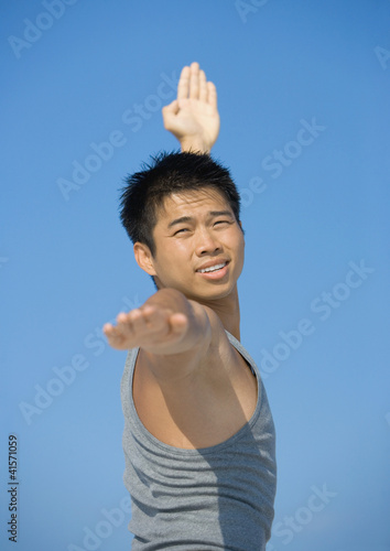 Photo: Man doing relaxation exercises Man doing relaxation exercises