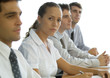 Business colleagues having meeting, focus on woman