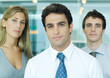 Young executives, looking at camera, portrait