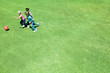 Children playing ball on grass