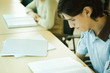 Young man studying in university library