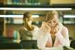 Young woman studying in university library