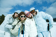 Photo: Group of teen girls in ski gear, portrait Group of teen girls in ski gear, portrait