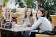 cute smiling women drinking a coffee