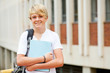 happy male high school student portrait in school