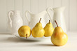 Fresh pears on wooden table