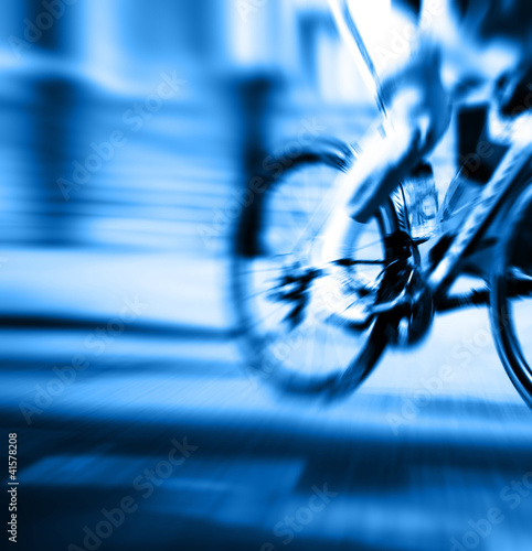 Photo: blue cyclist blur blue cyclist blur