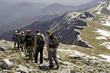 Walking on mountain ridge
