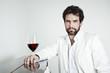 handsome man and a glass of red wine