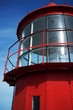 Lighthouse against blue sky.