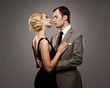 Retro couple on grey background.