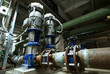 Equipment, cables and piping as found inside of  industrial powe
