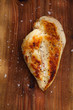 grolled seasoned Chicken breast on wooden board grolled seasoned Chicken breast on wooden board