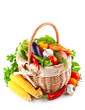 fresh vegetables with green leaves in basket isolated on white