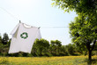 T-shirt with recycle logo drying on clothesline T-shirt with recycle logo drying on clothesline