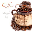 Coffee beans in a cup with the sample text