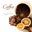 Coffee beans and spices: cinnamon, star anise and dried orange