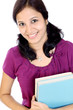 Young female student holding books