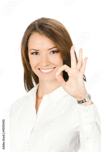 Photo: Businesswoman with okay gesture, on white Businesswoman with okay gesture, on white