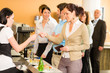 Cafeteria woman pay by credit card cashier