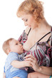 Photo: Young mother nurses the baby Young mother nurses the baby