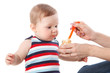 Young mother feeds her baby. Young mother feeds her baby.