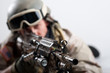 Soldier with rifle against white background.