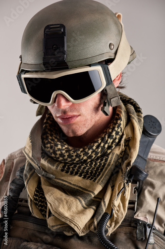 Photo: Close up portrait of soldier with mask and helmet. Close up portrait of soldier with mask and helmet.