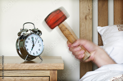 Photo: Alarm clock and sledgehammer Alarm clock and sledgehammer