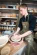 hands of a potter, creating an earthen jar on the circle hands of a potter, creating an earthen jar on the circle