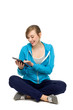 Foto: Female teenager using digital tablet Female teenager using digital tablet