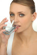 Blond drinking glass of water Blond drinking glass of water