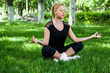 Beautiful teenage girl making exercises in the park in spring Beautiful teenage girl making exercises in the park in spring
