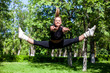 Beautiful teenage girl making exercises in the park in spring Beautiful teenage girl making exercises in the park in spring