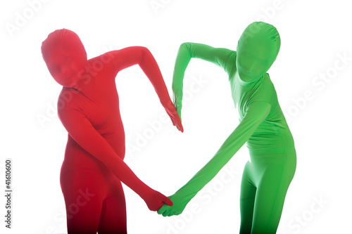 Photo: Green and Red people making a heart shape with their arms Green and Red people making a heart shape with their arms