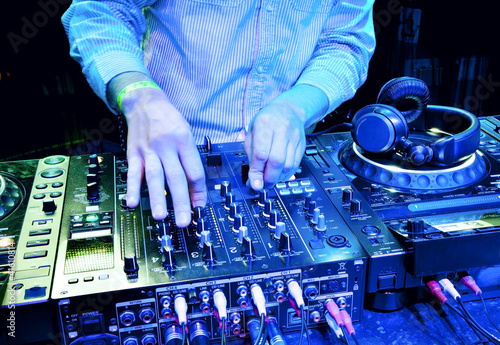 Photo: Dj mixes the track Dj mixes the track