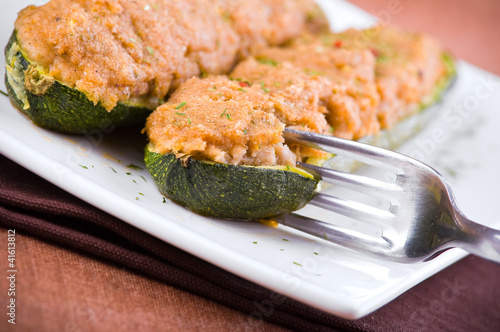 Photo: Stuffed zucchini halves. Stuffed zucchini halves.