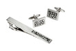 silver set of cuff links and tie pin isolated on white