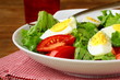 salad with eggs and fresh vegetables, on a plate salad with eggs and fresh vegetables, on a plate