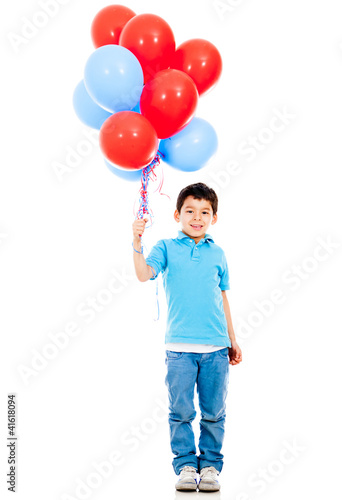 Photo: Boy holding balloons Boy holding balloons