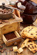 Coffee Mill, cups and biscuits.