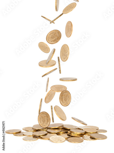 Photo: Heap of gold coins falling to the ground Heap of gold coins falling to the ground